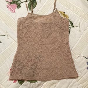 Small beige Lacey tank top in hood used condition